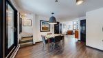 The condo features a fully equipped kitchen and dining space